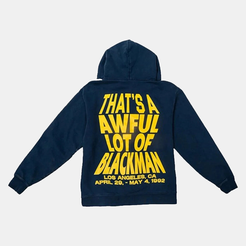 Navy blue hoodie with yellow text on a light gray background
