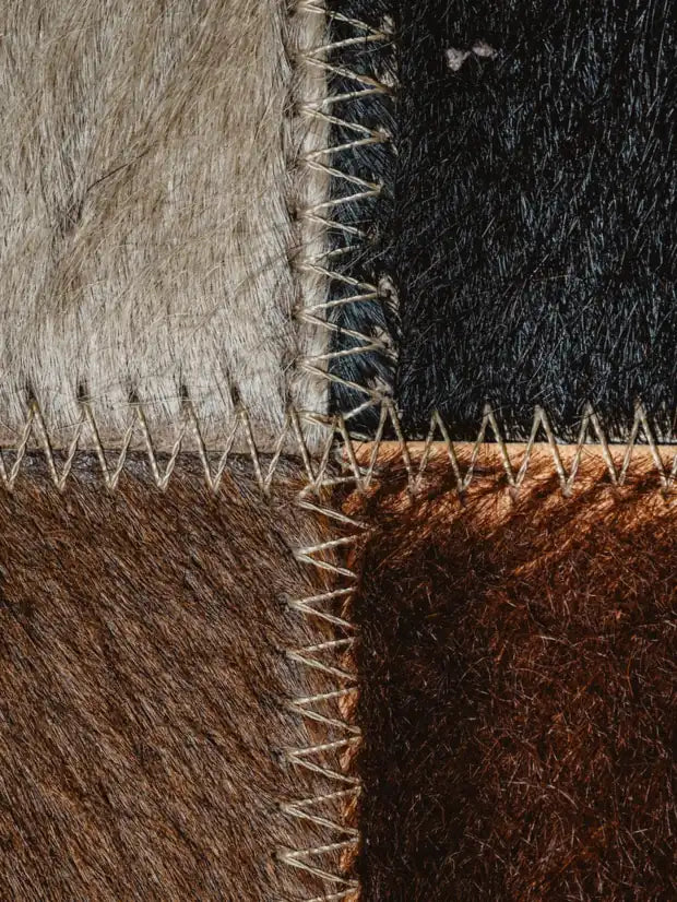 Panelled leather and shearling, stitched by hand